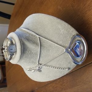 Chico's long silver necklace and watch